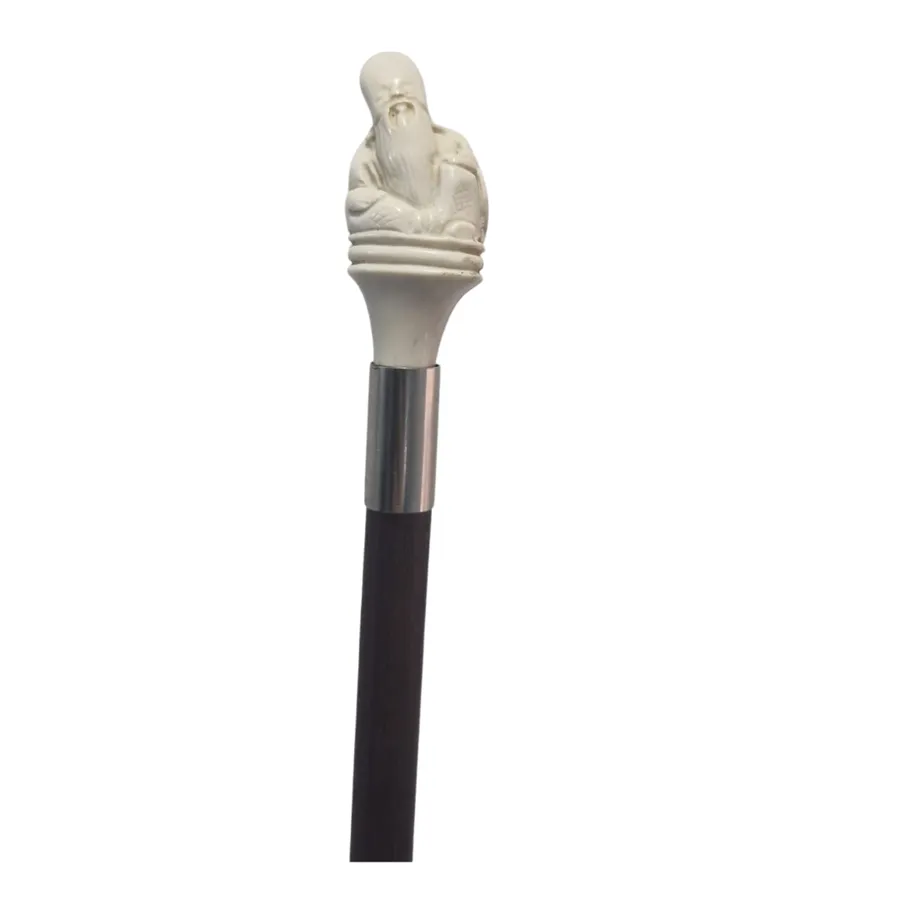 Baston cu manerul sculptat in forma de batran