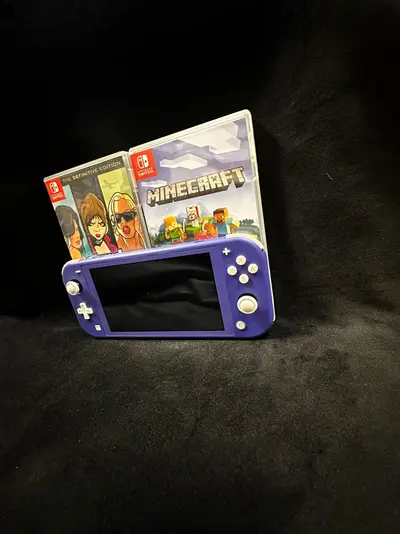 Nintendo Switch Lite + jocuri 2