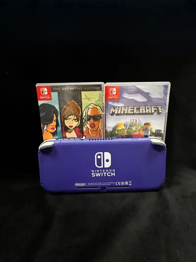 Nintendo Switch Lite + jocuri 3